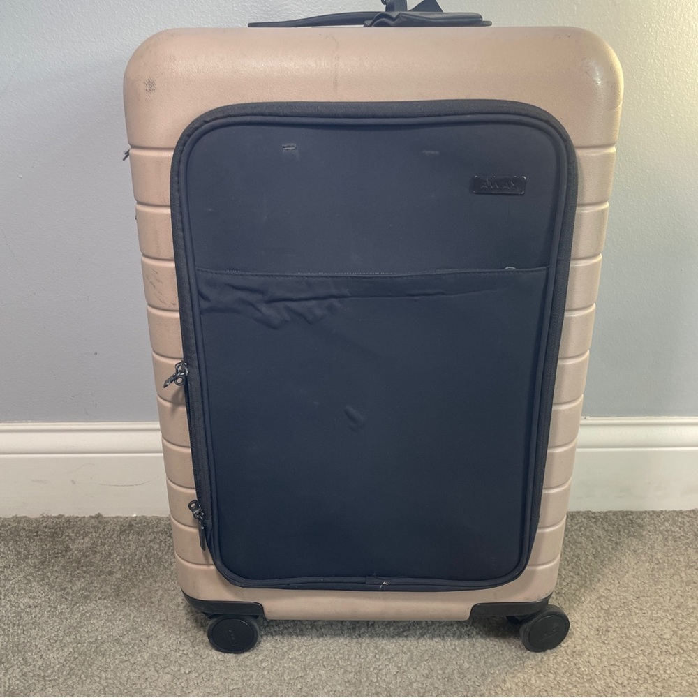 Away Carry on luggage with front pocket
